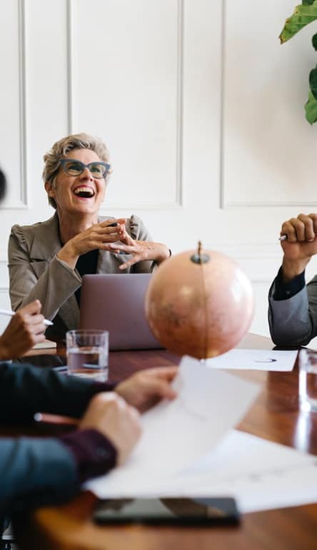 Trusted Expat insurance in Spain with Bilingual insurance advisors helping expats international residents in a modern office in Spain.